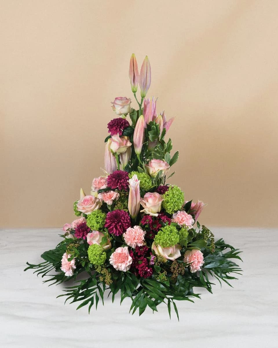Trauerarrangement aus rosa und weissen Blumen