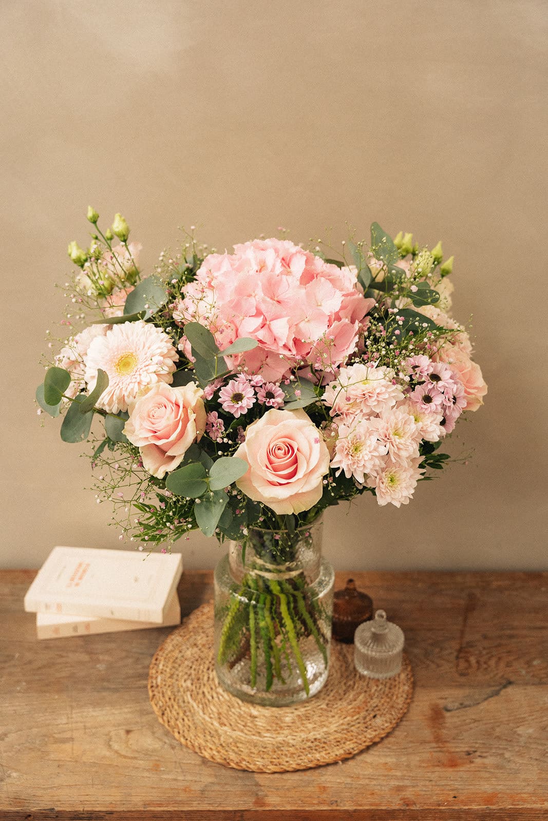 Pink and white bouquet in a glass vase